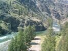 The view from a cliff above Woolard Camp on the Middle Fork of the Salmon as it winds through the canyon