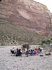 A rafting party sitting in a circle of chairs in Yampa Canyon