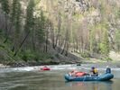 Three rafts going down a minor rapid on the Main Salmon River